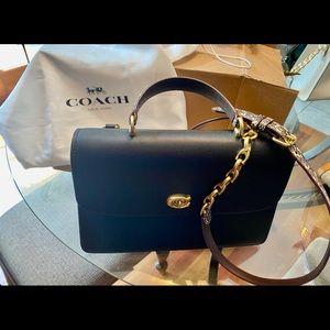 Coach black crossbody bag red inside